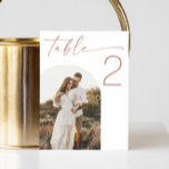 Blush Pink Script Wedding | Minimalist Arch Photo Table Number<br><div class="desc">Add a soft, romantic touch to your wedding reception with this elegant table number card featuring blush pink script and a custom arch photo. Designed in a minimalist style, this soft rose pink table number is perfect for blush, boho, or neutral themed weddings. Easily personalize with your table number and...</div>