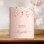 Blush rose gold stars dripping monogram name 2023 planner<br><div class="desc">A faux blush, rose gold metallic looking background with elegant faux rose gold glittery and shining stars falling, dripping. Personalize and add a year 2023 (or any year) and a name. The name is written in dark rose gold with a large modern hand lettered style script with swashes. To keep...</div>