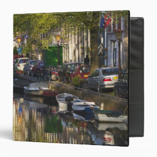Boats and buildings along the canal belt, binder