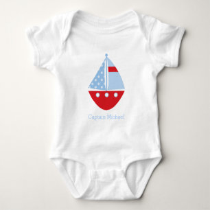 Body Bateau à voile rouge et bleu