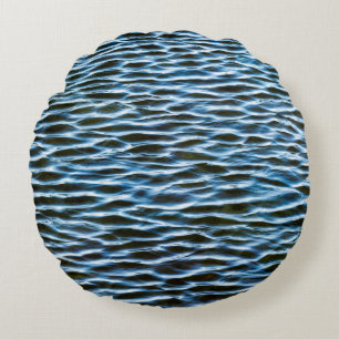 Body of water during daytime round pillow
