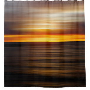 Body of water during sunset