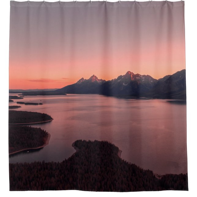 BODY OF WATER NEAR MOUNTAIN DURING SUNSET (Front)