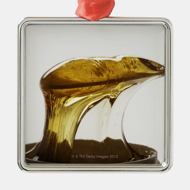 Body Wax Metal Ornament (Front)