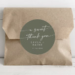 Boho Chic Olive Green A Sweet Thank You Favour Classic Round Sticker<br><div class="desc">This boho chic olive green a sweet thank you favour classic round sticker is perfect for a minimalist wedding. The woodsy dark green earth tone modern bohemian design features simple rustic calligraphy with a unique yet classic style.

Personalize your favour stickers with your names and wedding date.</div>