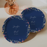 Boho Multicolor Wildflower Wedding Cake Paper Plate<br><div class="desc">This boho multicolor wildflower wedding cake paper plate is perfect for a modern wedding reception. The design features a multicolored assortment of pink,  blush,  purple,  yellow,  white,  violet,  red,  burgundy wild flowers.

Make it your own by adding the names of the bride and groom and wedding date.</div>