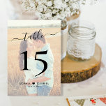 Boho Script Heart Photo Wedding Double Sided Table Number<br><div class="desc">Elegant Calligraphy Script Photo Overlay Wedding Table Numbers, Double Sided. Help your guests easily find their way with these simple elegant double sided table number cards. Featuring a pretty text "table" hand lettering calligraphy script, your favourite photo, numbers, between the names a little heart motif and date! Ideal for minimalist...</div>