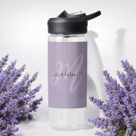 Boho Stylish Script Monogram and Name in Purple Water Bottle<br><div class="desc">So stylish and feminine this custom water bottle has boho chic lettering featuring your monogram initial in large modern font in lavender with your name in a black handwritten font over a purple background. The look is modern and attractive and all about you! Personalize with your name and initial. When...</div>