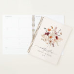 Boho Wildflower Elegant Fall Wedding Planner<br><div class="desc">Stay organized and embrace the beauty of boho charm with our Boho Wildflower Wedding Planner. This exquisite planner features a captivating wildflower bouquet on a cream background, adding a touch of nature's allure to your wedding planning journey. In vintage script, the words "Wedding Plans" elegantly adorn the cover, reflecting the...</div>