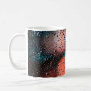 Bokeh photography of water droplets on clear glass coffee mug