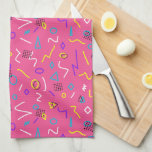Bold 1980s Memphis Style Shapes on Pink Pattern Kitchen Towel<br><div class="desc">This funky 80s Memphis style kitchen towel will look so fun and colourful hanging from your oven door. This design features blue,  purple,  white,  yellow,  and black squiggles,  triangles,  diamonds,  and circles on a bold pink background.</div>