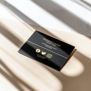 Bold black and gold social media luxury business card