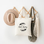 Bold Branch Wedding Monogram Tote Bag<br><div class="desc">Custom printed tote bags make a fun and functional wedding favour your guests will love! Personalize the template with the bride and groom's names or monogram initials. Add your wedding date, the city, state or venue name or any other custom text. This modern rustic logo-style design has bold leafy branches...</div>