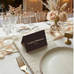 Bold Brown Typography Custom Wedding Place Card<br><div class="desc">This folded place card in brown and cream features a deep, modern background paired with clean serif typography for a refined table setting. The minimalist layout clearly displays each guest’s name and table number, making it easy for guests to find their seat at a glance. Personalize the text to coordinate...</div>