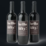 Bold Earthy Brown Modern 50th Birthday Custom Wine Label<br><div class="desc">This custom wine bottle label in brown and cream features bold,  modern typography with a playful ‘Hello Fifty’ headline and a neutral color palette. Ideal for 50th birthday celebrations,  dinner parties,  and or any milestone events. Personalize the name,  date,  and location to match your celebration details.</div>