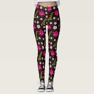 Bold floral pattern on black background leggings