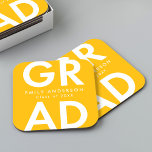 Bold Grad Yellow Graduation Party Square Paper Coaster<br><div class="desc">Custom graduation paper coasters featuring "Grad" in bold white lettering with a yellow background. Personalize the graduation coasters by adding the graduate's name and graduation year. The personalized graduation coasters are perfect for both high school and college graduation parties.</div>