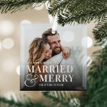 Bold Married & Merry Wedding Photo Newlywed Glass Ornament<br><div class="desc">Display a favourite wedding photo with this bold,  modern typography-based Christmas design,  featuring "married & merry" overlaid in white lettering joined by an oversized ampersand. Personalize with your wedding date and names.</div>