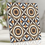 Bold Mid-Century Design with Concentric Circles Tile<br><div class="desc">This bold mid-century modern tile features concentric circles and abstract lines in earthy brown, ochre yellow, and vintage blue tones, inspired by 1960s Scandinavian design. With its symmetrical and eye-catching layout, this tile is perfect for creating stylish backsplashes, accent walls, or retro-inspired interiors. The harmonious colour palette and geometric design...</div>