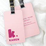 Bold monogram initial and name pink burgundy luggage tag<br><div class="desc">Luggage tag featuring your monogram initial in a big,  bold font and your name below. Burgundy text on a pink background. Colours are customizable in the design tool. Add your contact information on the back.</div>