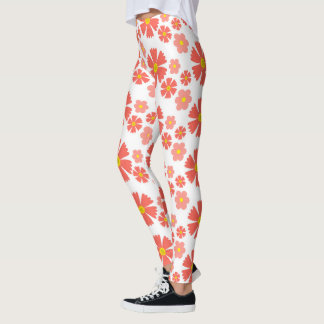 Bold pink daisy floral design on clean white base leggings