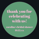 Bold Pink Green Custom Bridal Shower  Thank You Classic Round Sticker<br><div class="desc">This personalized round sticker features bold pink typography on a fresh green background for a fun, modern bridal shower look. The cheerful message is perfect for sealing envelopes, decorating favor bags, gift boxes, or thank you notes at a bridal shower celebration. Customize the name and date to match your event...</div>