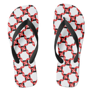 Bold red, black, and white graphic pinwheel  flip flops