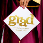 Bold simple modern gold typography on white graduation cap topper<br><div class="desc">Your favourite grad will stand out and make a statement when they wear this graduation cap topper! Let them celebrate their milestone with this stunning, simple, modern, custom graduation keepsake. Bold, graphic, faux gold foil typography overlays a white background. Personalize with your grad’s name and class year. Matching announcements, address...</div>
