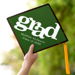 Bold typography green simple modern graphic name graduation cap topper<br><div class="desc">Your favourite grad will stand out and make a statement when they wear this graduation cap topper! Let them celebrate their milestone with this stunning, simple, modern, custom graduation keepsake. Bold, graphic, white typography overlays a hunter green background. Personalize with your grad’s name and class year. Matching announcements, address labels,...</div>