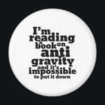 Book on Anti Gravity Funny Science Geek Puns Magnet<br><div class="desc">I'm reading a book on anti gravity and it's impossible to put it down. Funny science pun design for those who love to study science. Cool and humourous quote merchandise for college students majoring in Physics. Perfect for scientist and physicist. Great Christmas gift and birthday present for family and friends....</div>