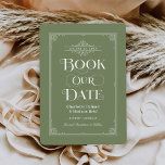 Book Our Date Green Vintage Book Cover Wedding Save The Date<br><div class="desc">These unique wedding save the date cards for book lovers feature a vintage book cover design with a scrolls that frame the wedding date, an ornate "Book Our Date" title, the Bride & Groom names as the authors, a moss green background / book colour (that can be modified), complete with...</div>