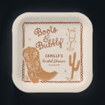 Boots and Bubbly Whimsical Hand Drawn Paper Plate<br><div class="desc">Elevate your bridal shower with our charming Boots and Bubbly hand-drawn whimsical personalized plates! Ensuring both style and functionality. Ideal for brides-to-be looking for unique party supplies, these paper plates are a must-have for any bridal shower. Remember you have the option of changing the colour palette. Matching items in Cava...</div>