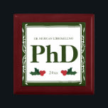Border Green Holly Name Year PhD Graduation Gift Box<br><div class="desc">A square Phd graduation keepsake box with a Christmas feel. The top has a decorative border and a holly berry and leaf accents. It has a green and white colour scheme and shows the degree, name, and year. Simply customize this box, add it to your cart, and give it to...</div>