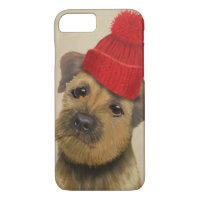 Border Terrier with Red Bobble Hat