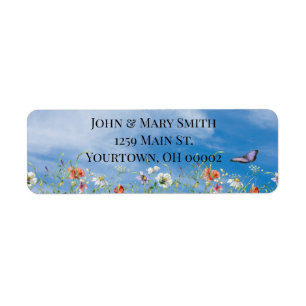 Bordure fleur sauvage et papillon