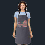 Born in 1972 vintage birthday gift apron<br><div class="desc">You can add some originality to your wardrobe with this modern purple and pink colour elegant original birthday sunset distressed vintage retro-looking design with awesome typography font lettering, it is a great gift idea for women, wives, and girlfriends who will love this one-of-a-kind artwork. The best unique and most fun...</div>