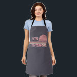 born in 1975 vintage 50th birthday party apron<br><div class="desc">Make your birthday special with this unique design. Add a touch of sophisticated elegance to your birthday celebration with our exquisite, one-of-a-kind designs. These graphics bring sophistication and originality to any product, creating a memorable and stylish gift. They are perfect for those who appreciate a touch of timeless glamour on...</div>