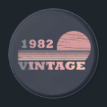 born in 1982 vintage birthday gift magnet<br><div class="desc">You can add some originality to your wardrobe with this modern and elegant purple and pink colour sunset vintage retro-looking birthday design with awesome typography font lettering, it is a great gift idea for women, wives, and girlfriends who will love this one-of-a-kind artwork. The best and most fun holiday present...</div>