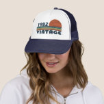 Born in 1982 vintage birthday trucker hat<br><div class="desc">You can add some originality to your wardrobe with this original 1982 vintage sunset retro-looking birthday design with awesome colours and typography font lettering, is a great gift idea for men, women, husband, wife girlfriend, and a boyfriend who will love this one-of-a-kind artwork. The best and most fun holiday present...</div>