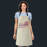 born in 1984 vintage birthday apron<br><div class="desc">You can add some originality to your wardrobe with this modern and elegant purple and pink colour sunset vintage retro-looking birthday design with awesome typography font lettering, it is a great gift idea for women, wives, and girlfriends who will love this one-of-a-kind artwork. The best unique and funny holiday present...</div>
