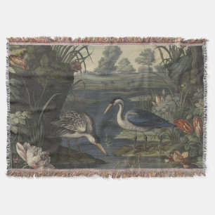 Botanical scene of blue cranes by a river throw blanket
