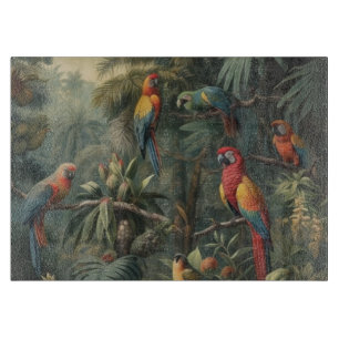 Botanical scene of parrots and pineapples cutting board