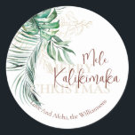 Botanical Tropical Mele Kalikimaka | Custom  Classic Round Sticker<br><div class="desc">Green watercolor tropical leaves with line art gold tropical flowers. Elegant modern Hawaiian Christmas design with a Mele Kalikimaka Hawaiian Christmas text and a custom family name. Christmas celebrations are always fun and bring happiness and warmth to everyone’s lives. And Christmas in Hawaii has its unique charm, fervour, and joy....</div>