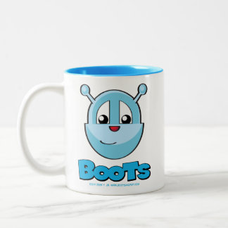 Bottes et tasse de chiot