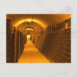 Bottles aging either in pupitres (racks) waiting postcard