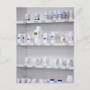 bottles on the shelves at a pharmacy postcard