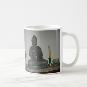 Bouddha changent la tasse