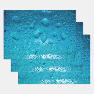 Boues d'eau Aqua sur le papier d'enveloppement pho