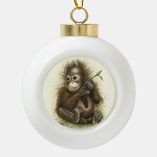 Boule En Céramique Bébé d'orang-outan avec le feuille