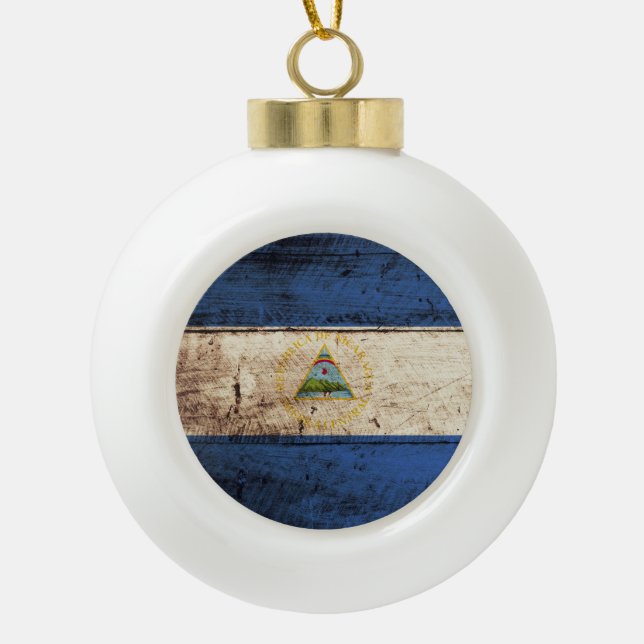 Boule En Céramique Drapeau du Nicaragua sur le vieux grain en bois (Devant)